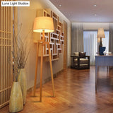 Modern Wood Tripod Floor Lamp With Fabric Shade - Simple & Stylish Design