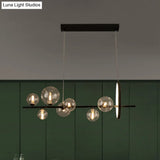Modernist 7-Bulb Glass Island Light For Restaurants - Hanging Pendant With Transparent Ball Shades