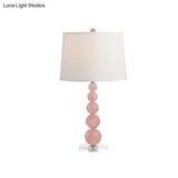 Modernist Fabric Barrel Shade Nightstand Lamp: Single White Table Light With Pink Glass Orb Stand