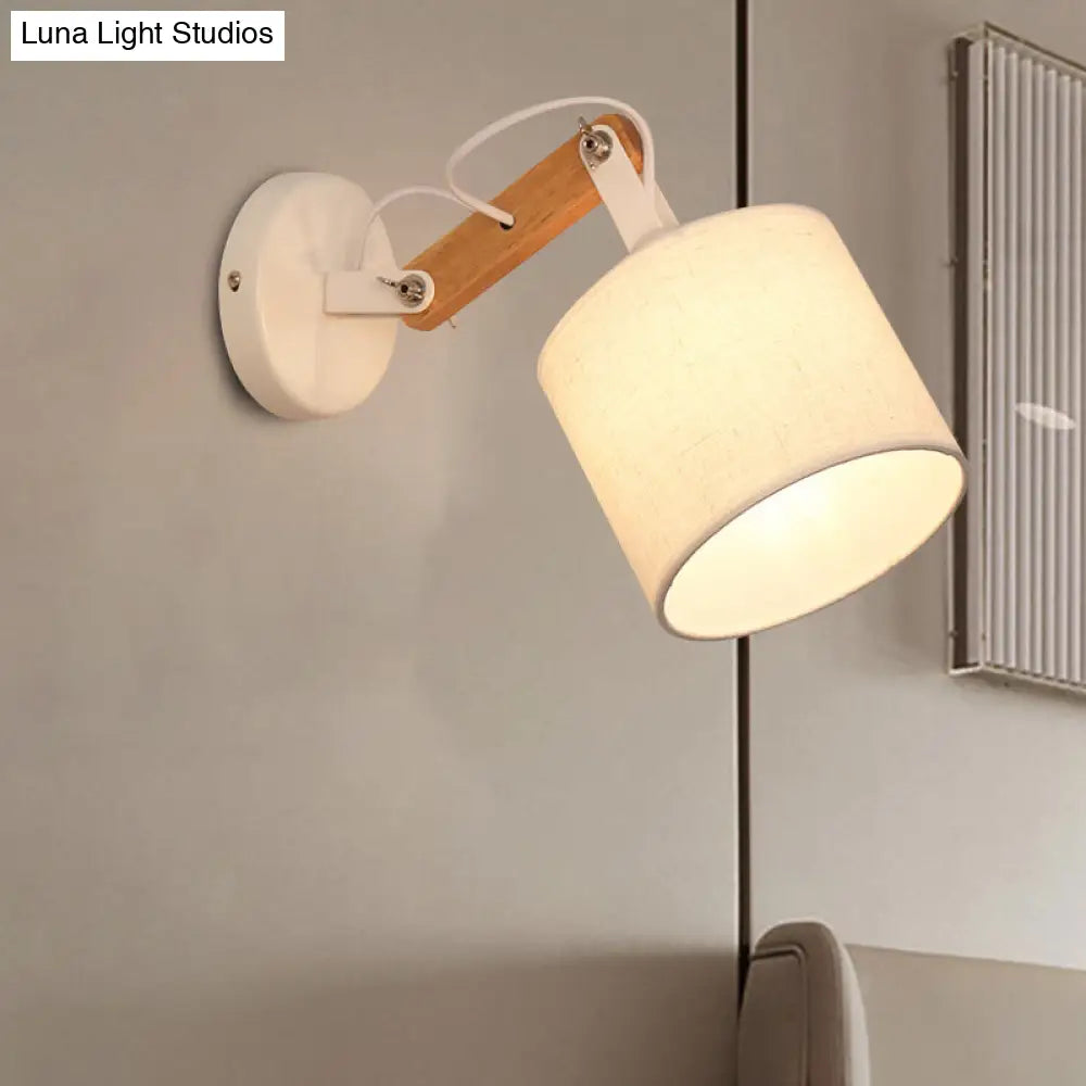 Modernist Fabric Cylinder Wall Lamp With Adjustable Wood Arm And White Bulb