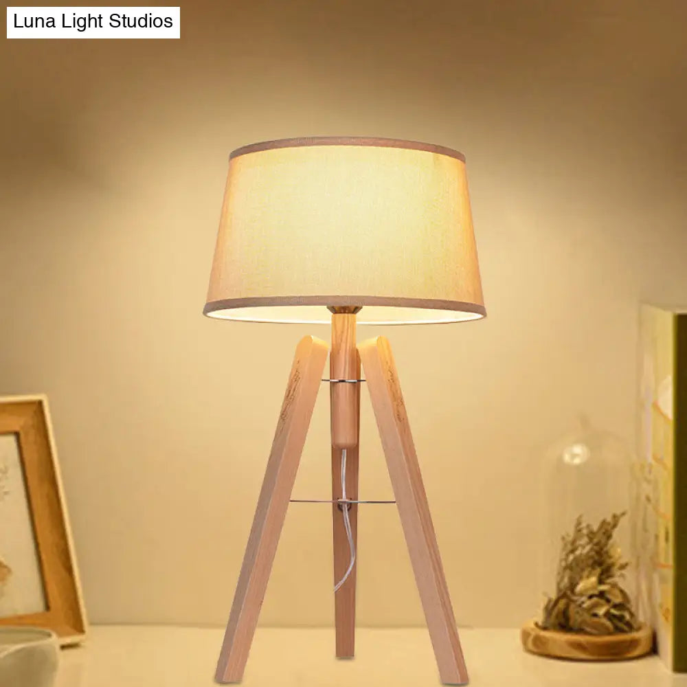 Modernist Fabric Tapered Desk Lamp With Wood Tripod - 1 Bulb Night Table Light In Brown/Beige