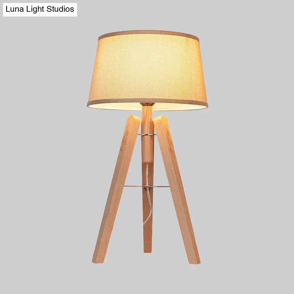 Modernist Fabric Tapered Desk Lamp With Wood Tripod - 1 Bulb Night Table Light In Brown/Beige