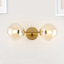 Modernist Gold Wall Lamp With Clear Glass Shade - 2 Lights Spherical Mount Fixture