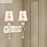 Modernist Gold Wall Mount Lamp With Arced Painted Glass Shade For Bedroom Lighting