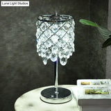 Modernist Led Lounge Table Lamp Clear/Champagne Crisscross Cylinder Nightstand Light