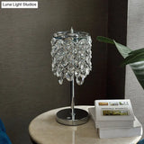 Modernist Led Lounge Table Lamp Clear/Champagne Crisscross Cylinder Nightstand Light