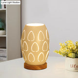 Modernist Oblong White Night Table Lamp With Hollow Out Design - Sleek Metal Construction 1 Head For