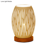 Modernist Oblong White Night Table Lamp With Hollow Out Design - Sleek Metal Construction 1 Head For