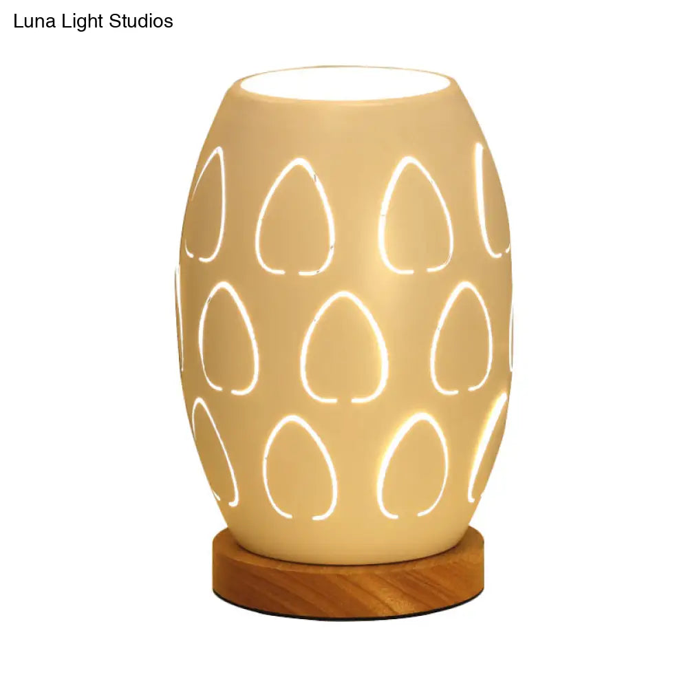 Modernist Oblong White Night Table Lamp With Hollow Out Design - Sleek Metal Construction 1 Head For