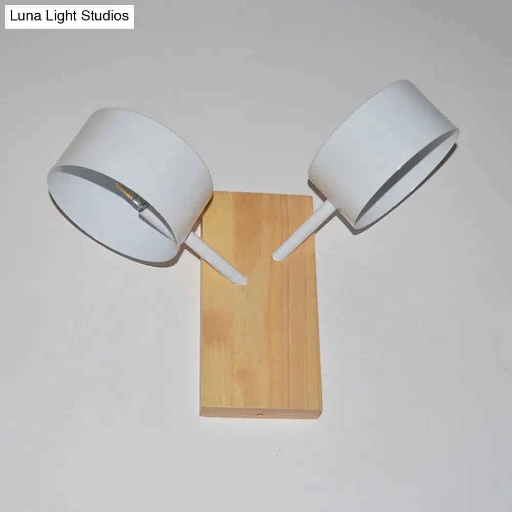 Modernist White Dual Drum Wall Light Fixture With 2 Iron Sconce Heads And Wood Backplate
