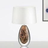 Modernist White Fabric Desk Lamp With Teardrop Brown Glazed Crystal Base - 1 Head Tapered Table