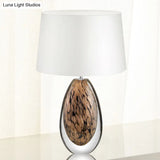 Modernist White Fabric Desk Lamp With Teardrop Brown Glazed Crystal Base - 1 Head Tapered Table