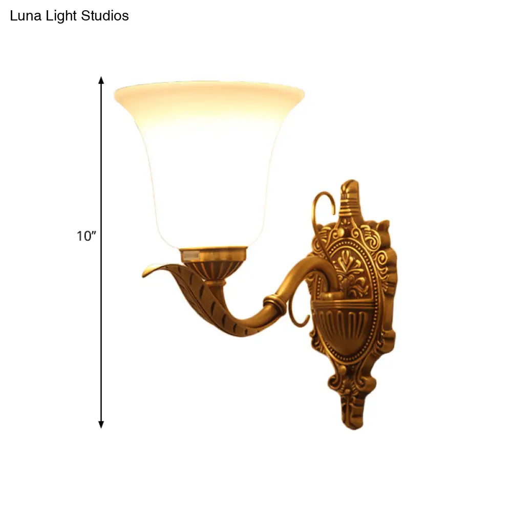 Opal Glass Brass Wall Mount Light - Traditional Style With Carved Backplate 1 Bell Shade