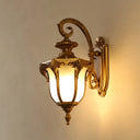 Outdoor Acorn Sconce Light Fixture With Swirl Arm And White Glass - Black/Brass Finish Wall Lamp