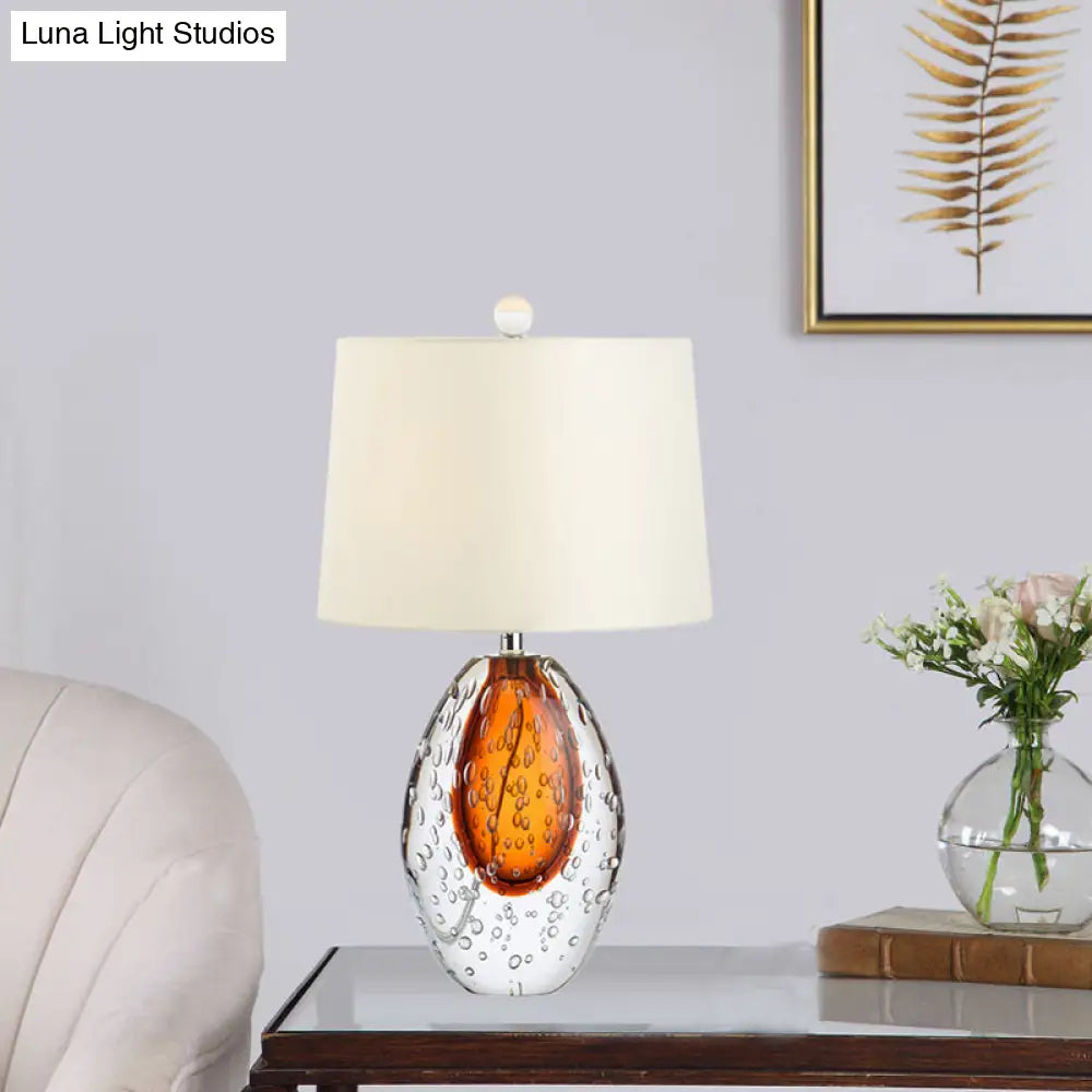 Oval Desk Lamp With Clear Bubble Glass Ideal For Bedroom Or Night Table Modern Design In White