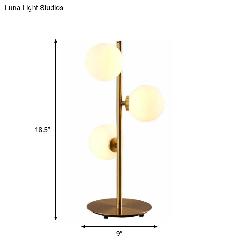 Post-Modern Gold Table Lamp Set With Globe White Glass Shades - Of 3 Lights