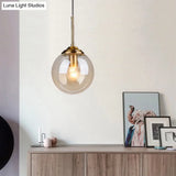 Postmodern Glass Pendant Light: Sphere Drop Design With Bedside & Ceiling Mounts - Brass Finish