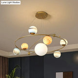 Postmodern Glass Planet Hanging Lamp With Brass Finish Ideal For Living Room
