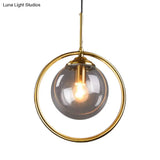 Postmodern Gold Globe Pendant Lamp With Smoke Gray/Clear Glass For Bedroom Lighting