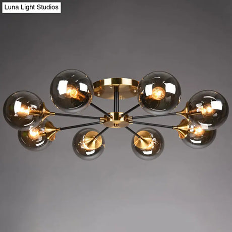 Radial Flush Mount Black And Brass Ceiling Light With Glass Ball Shade