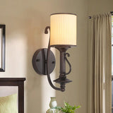 Retro Black Cylinder Wall Light With Metal Curvy Arm: Fabric Shade 1-Light Living Room Lamp