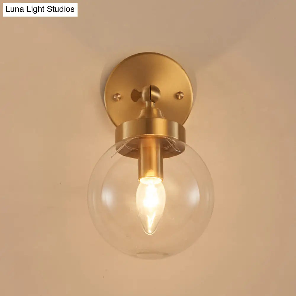 Rotatable Bedroom Wall Lamp In Brass With Clear Glass And Modernist Ball Design