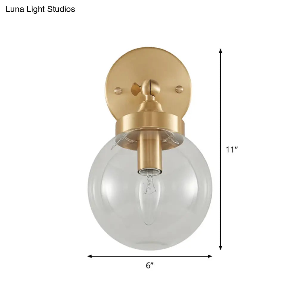 Rotatable Bedroom Wall Lamp In Brass With Clear Glass And Modernist Ball Design