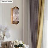 Rural Crystal Cylinder Wall Sconce In Brass - 1-Light Indoor Fixture