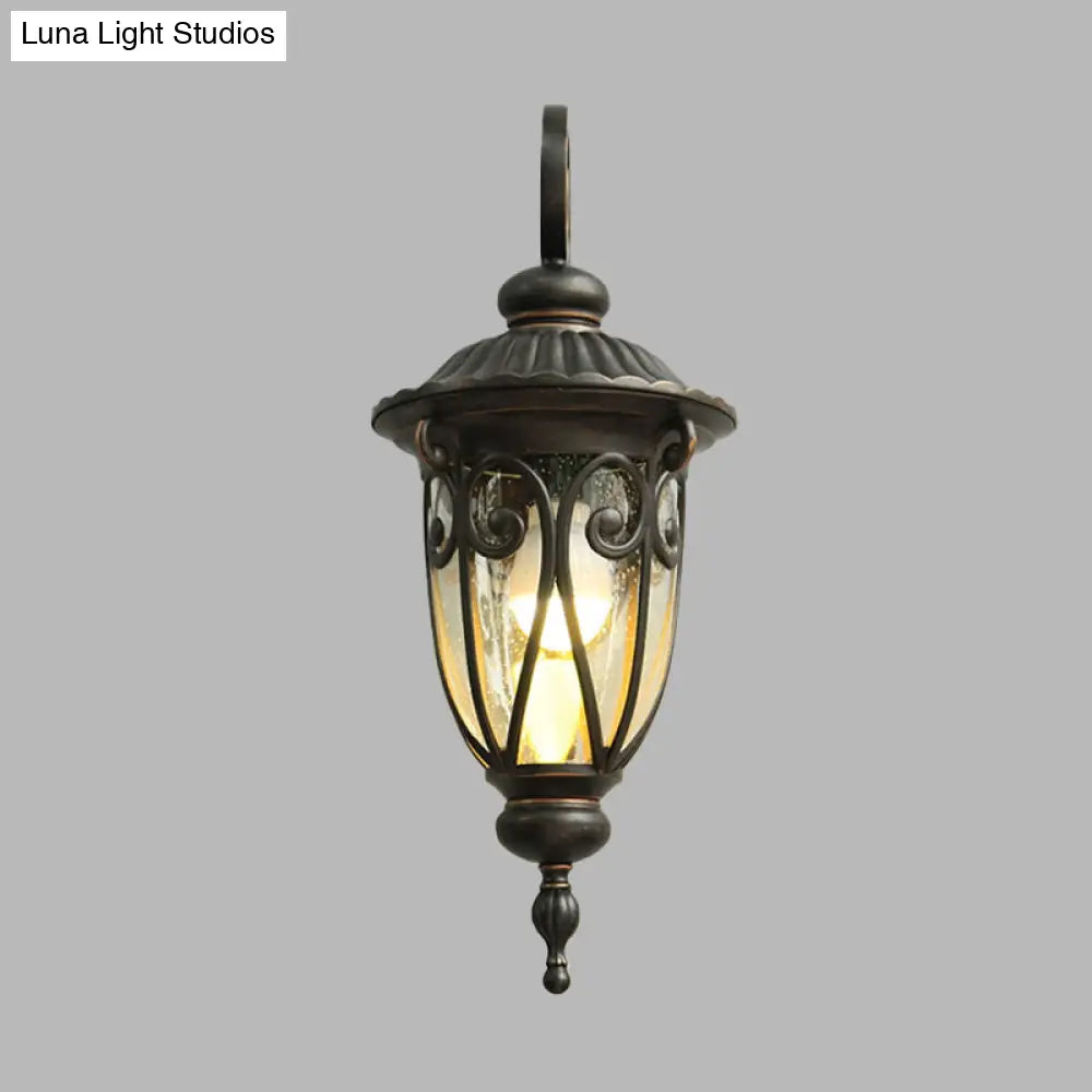 Rustic Acorn Wall Sconce Lamp With Clear Seeded Glass In Black - 1-Bulb Mounted Fixture