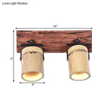 Rustic Bamboo Wall Sconce With Linear Wood Backplate