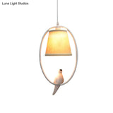 Rustic Beige Pendant Light With Bird Accent - Stylish Oval Metal Ceiling For Hotels

This Improved