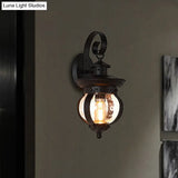 Rustic Black Lantern Wall Sconce With Seedy Glass - Bedroom Lighting Fixture
