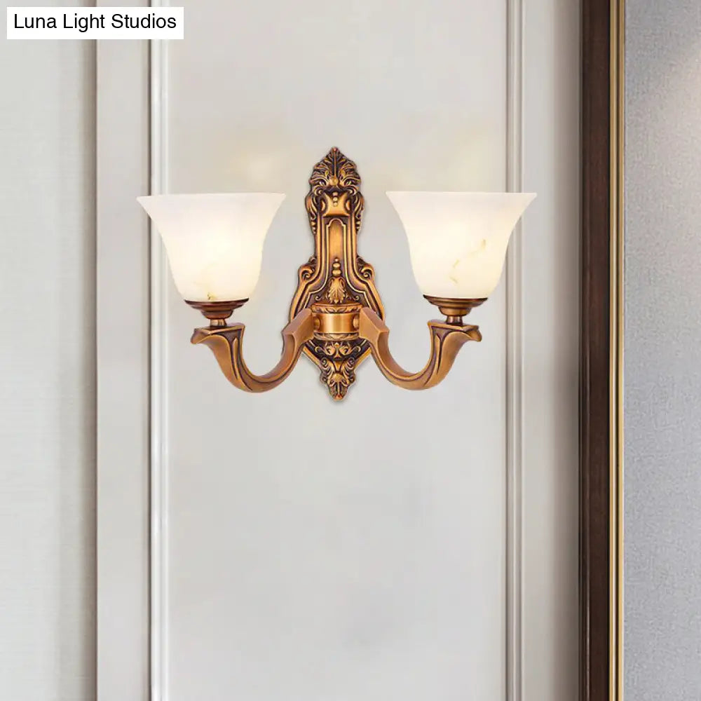Rustic Brass Bedroom Wall Sconce With Frosted Glass Shade - 2 Light Bell Lamp