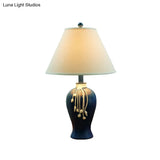 Rustic White Fabric Night Lamp With Blue Ceramic Bottle Base