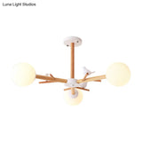 Rustic Wood Pendant Light With White Globe Shade And Bird Detail - Ideal For Dining Room