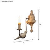 Rustic Wood Swooping Arm Wall Lamp With Distressed White Sconce - Decorative Candle And Bird Accents