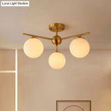Simplicity Milk Glass Globe Semi Flush Mount Light - 3 - Bulb Antiqued Gold Ceiling Fixture