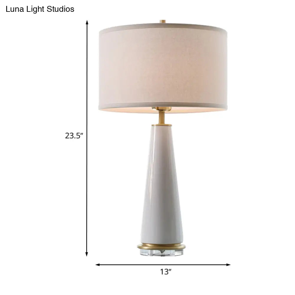 Simplicity White Ceramic Base Nightstand Lamp With Fabric Drum Shade - 1-Head Design