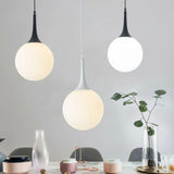 Sleek Cream Glass Pendant Light For Dining Room Minimalist Spherical Suspension