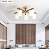 Sleek Beige Semi Mount Light Fixture With Cylinder Cream Glass Shade And Wooden Canopy
