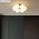 Sleek Brass Domed Semi Flush Mount Ceiling Lamp With Cream Glass - Stylish Bedroom Lighting