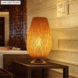 Sleek Egg-Like Rattan Bedside Table Lamp - Single-Bulb Nightstand Light With Wood Accent