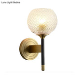 Sleek Glass Globe Wall Sconce: Ribbed Simplicity Brass Finish Mounted Light Fixture