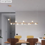Sleek Glass Pendant Light For Dining Room With Hanging Island Design