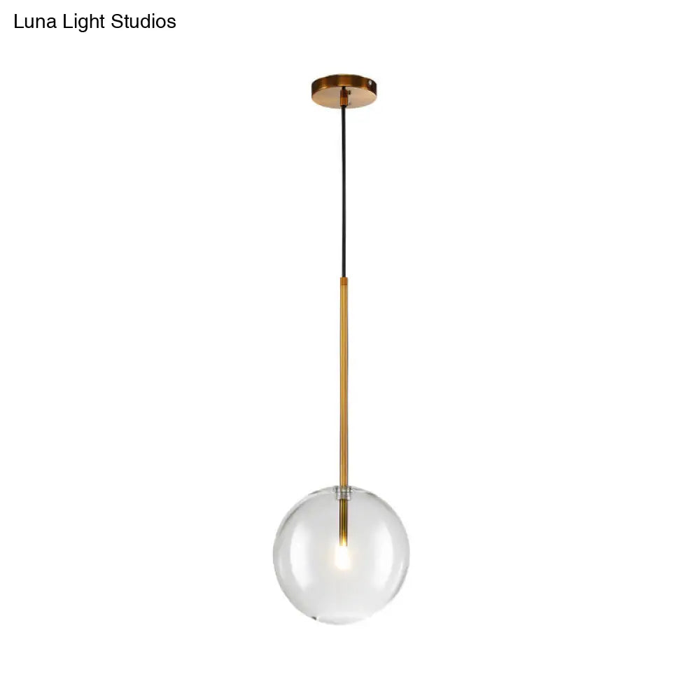 Sleek Gold Pendant Over Table: Clear Glass Globe Suspension Lighting (6/8/10 Wide)