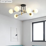 Sleek Ivory Glass Ball Flush Ceiling Light In Simple Black - Brass - Semi Mount For Dining Room