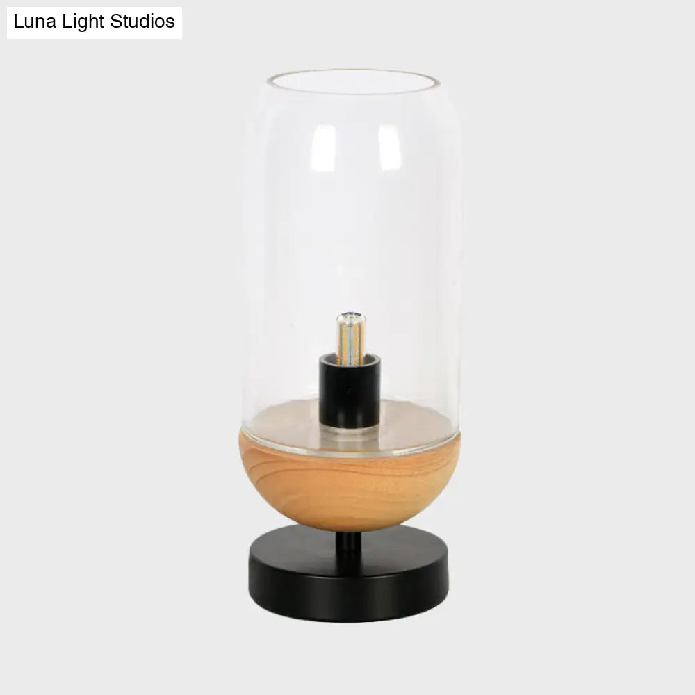 Sleek Led Table Lamp: Modern Black & Wood Cylinder Design With Clear Glass Shade