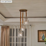 Sleek Metal Curvy Arm Pendant Light - Simplicity 3 Gold Heads Crystal Strands