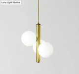 Sleek Minimalist Glass Chandelier - Modern Linear Fixture With 3 Spherical Frosted Lights