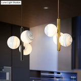 Sleek Minimalist Glass Chandelier - Modern Linear Fixture With 3 Spherical Frosted Lights